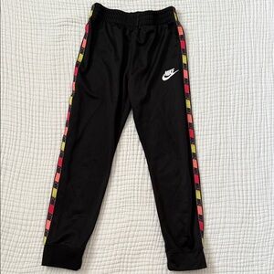 Nike Kids Black Track Joggers with Multicolor Stripes